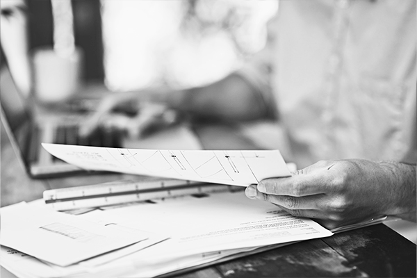 A person reviewing invoices