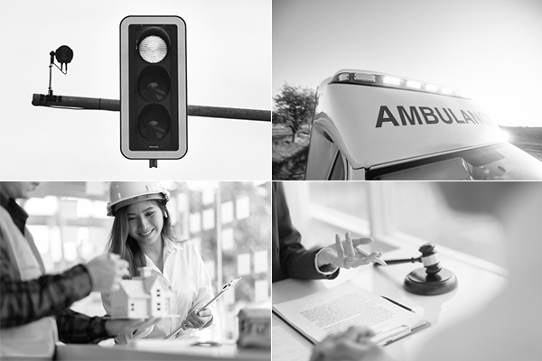 Red light, ambulance, construction workers, and legal scene